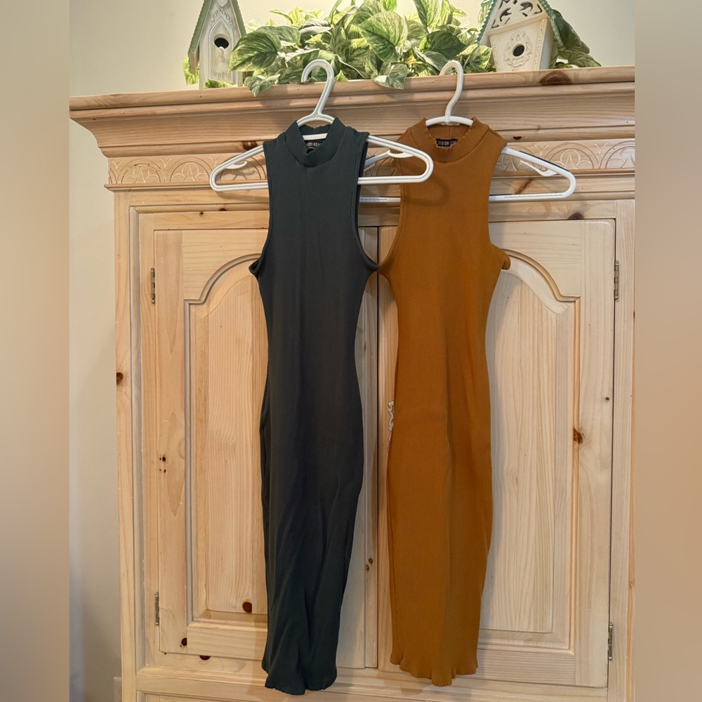2 FASHION NOVA  body con dresses, size L.